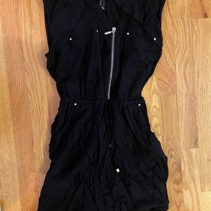 Black thigh length sleeveless dress